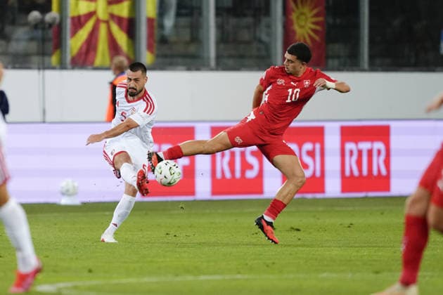 Luzern, Switzerland - October 06: Mohamed Zeki Amdouni (10 SUI) jumps for a kick against Gjoko Zajkov (5 MKD) during the UEFA Nations League match between Switzerland and North Macedonia at thermoplan arena on October 06, 2026 in Luzern, Switzerland. Copyright: xKjetilxWaberx xSPPx Sportspressphoto_SPR247221