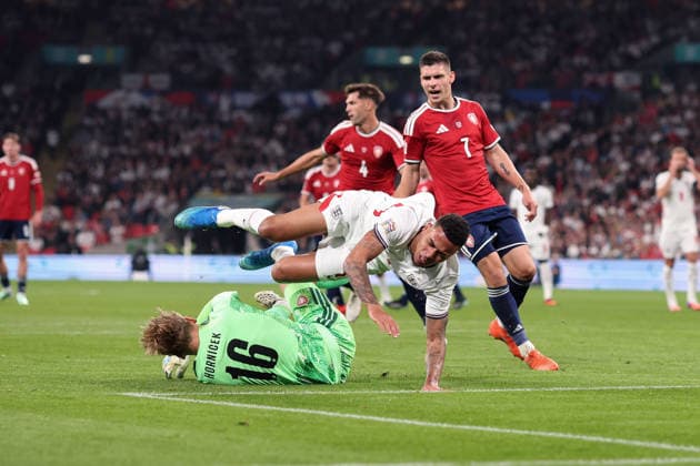 England v Czechia 06 October 2026, London - International Football - UEFA Nations League - England v Czechia - Czechia goalkeeper Lukas Hornicek punches the ball clear and sends Morgan Rogers of England flying - Photo: Charlotte Wilson Offside. London UK Copyright: xCharlottexWilsonx xOffsidexOffside