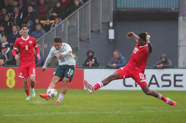 U21, U 21 Wales v U21 Austria, U21 UEFA EUROPEAN CHAMPIONSHIPS, Qualifier Jacob Hödl of Austria Under 21 shoots and Reece Munro of Wales Under 21 attempts to block during the U21 UEFA EUROPEAN CHAMPIONSHIPS qualification match between U21 Wales and U21 Austria at the Oval, Caernarfon, UK on 6 October 2026. Caernarfon the Oval Wales UK Editorial use only , Copyright: xAlunxRobertsx PSI-24971-0111
