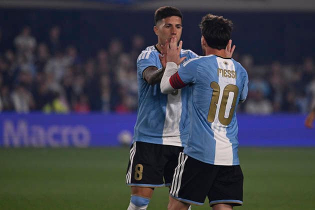 BUENOS AIRES, ARGENTINA - OCTOBER 06 : Forward Lionel Messi 10 of Argentina high-fives teammate Enzo Fernandez 8 during an International Friendly, Länderspiel, Nationalmannschaft match against Benin at Estadio Monumental on October 06, 2026 in Buenos Aires, Argentina. This historic match marks the final international appearance who wore a commemorative special-edition kit replacing the traditional manufacturer branding with his personal signature logo. Photo by SFSI Argentina national team, Nationalteam v Benin Copyright: xSFSIx