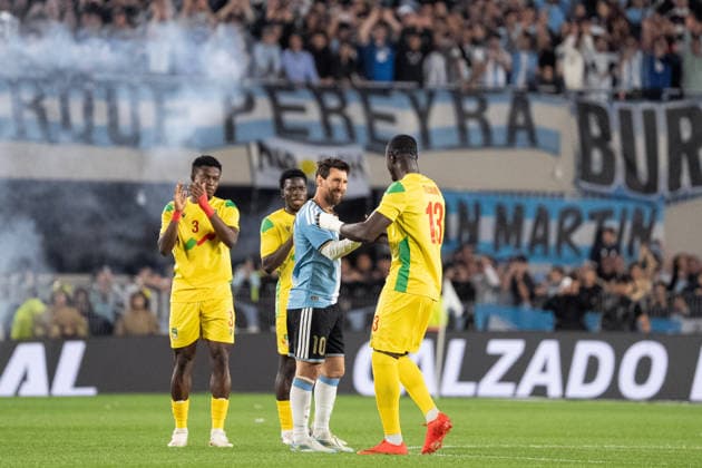 BUENOS AIRES, ARGENTINA - OCTOBER 06: Lionel Messi of Argentina (C) is greeted by Mohamed Tijani of Benin (R) and Tamimou Ouorou of Benin (L) during the International Friendly, Länderspiel, Nationalmannschaft football match between Argentina and Benin at Estadio Monumental Antonio V. Liberti on October 06, 2026 in Buenos Aires, Argentina. (Photo by Richard Callis Sports Press Photo) Copyright: xRichardxCallis SportsxPressxPhotox Sportspressphoto_SPR247810