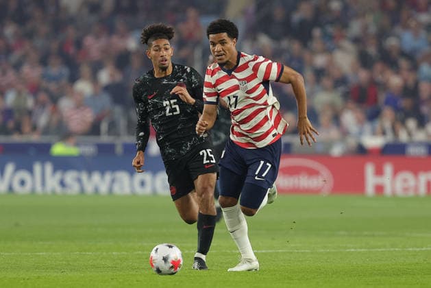SAINT PAUL, MN - OCTOBER 06: United States forward Malik Tillman (17) runs with the ball while Canada defender Saliba (25) defends during the first half of the men™s friendly match between the U.S. national team, Nationalteam and Canada™s national team on October 6th, 2026, at Allianz Field in Saint Paul, MN. (Photo by Bailey Hillesheim Icon Sportswire) SOCCER: OCT 06 USA vs Canada EDITORIAL USE ONLY Icon20261006001