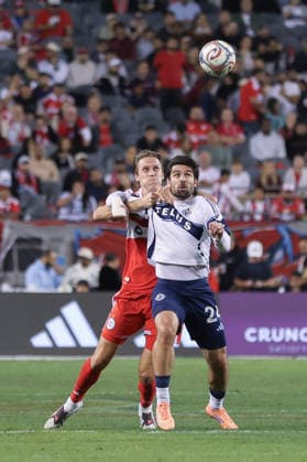 CHICAGO, USA - October 6: Jack Elliott (3 Chicago Fire FC) grabs onto Brian White (24 Vancouver Whitecaps FC) during the Major League Soccer game between Chicago Fire FC and Vancouver Whitecaps FC at Soldier Field on Tuesday October 6 in Chicago, USA Copyright: xShainaxBenhiyoun SPPx Sportspressphoto_SPR247858