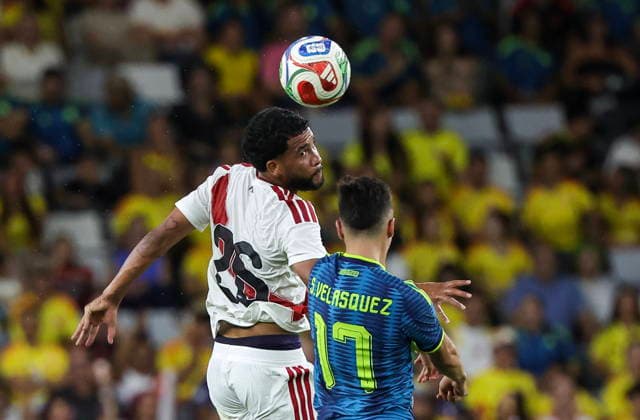 International soccer friendly - Colombia vs. Peru Peru midfielder Piero Magallanes (L) in action against Colombia midfielder Samuel Velasquez (R) during the international soccer friendly between Colombia and Peru at Nu Stadium in Miami, Florida, USA, 06 October 2026. MIAMI FLORIDA United States  Copyright: xCRISTOBALxHERRERA-ULASHKEVICHx