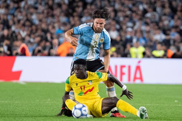 BUENOS AIRES, ARGENTINA - OCTOBER 06: Nicolas Tagliafico of Argentina (R) and Rodolfo Aloko of Benin (L) fight for possession during the International Friendly, Länderspiel, Nationalmannschaft football match between Argentina and Benin at Estadio Monumental Antonio V. Liberti on October 06, 2026 in Buenos Aires, Argentina. (Photo by Richard Callis Sports Press Photo) Copyright: xRichardxCallis SportsxPressxPhotox Sportspressphoto_SPR247890