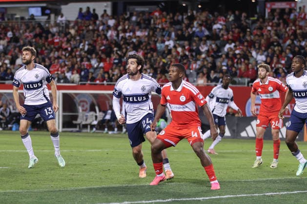 CHICAGO, USA - October 6: Brian White (24 Vancouver Whitecaps FC) and Mbekezeli Mbokazi (4 Chicago Fire FC) are seen during the Major League Soccer game between Chicago Fire FC and Vancouver Whitecaps FC at Soldier Field on Tuesday October 6 in Chicago, USA Copyright: xShainaxBenhiyoun SPPx Sportspressphoto_SPR247941
