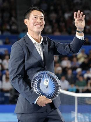 Tennis: Retirement ceremony for Nishikori Former world No. 4 Kei Nishikori waves to the crowd during his retirement ceremony at Ariake Tennis Forest Park in Tokyo on Oct. 6, 2026.  A14AA0005630269P