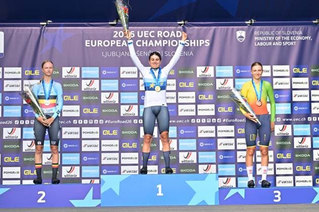 Belgium s Laura Five; Spain s Alejandra Neira Dominguez and Lithuania s Auguste Mikutyte celebrate on the podium of the Women Junior Individual Time Trial race (22km) at the cycling UEC Road European Championships, in Ljubljana, Slovenia, on Wednesday 7 October 2026. The UEC Road European Championships are taking place from 02 to 07 October in Ljubljana, Slovenia. DAVIDxPINTENS  x189034002x