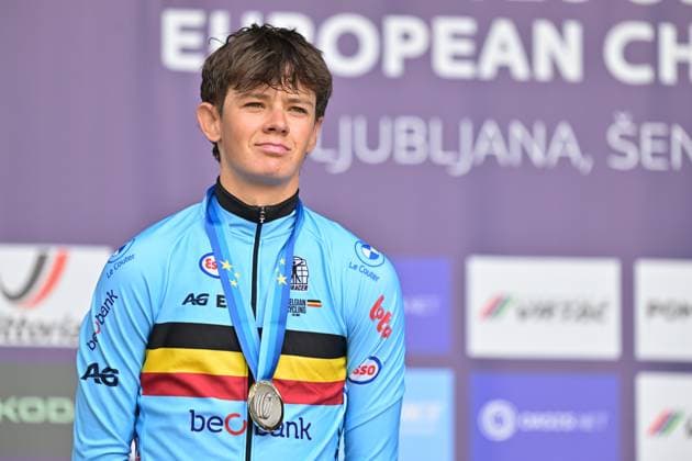 Belgium s Matisse Van Kerckhove , winner of the silver medal celebrates on the podium of the Men U23 Individual Time Trial race (22km) at the cycling UEC Road European Championships, in Ljubljana, Slovenia, on Wednesday 7 October 2026. The UEC Road European Championships are taking place from 02 to 07 October in Ljubljana, Slovenia. DAVIDxPINTENS  x189042173x