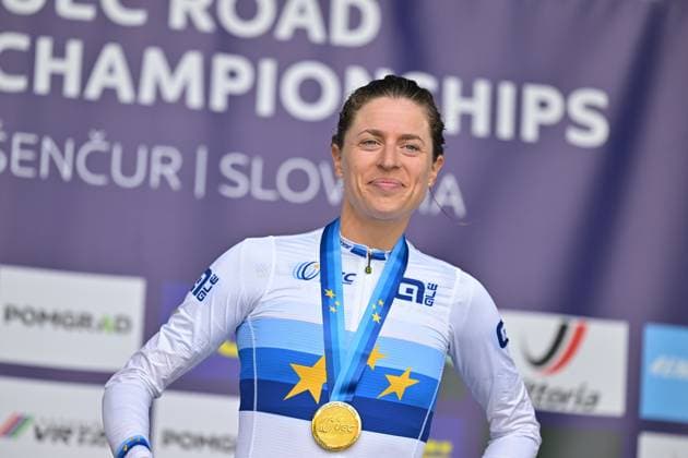 Switzerland s Marlen Reusser celebrates on the podium after winning the Women Elite Individual Time Trial race (22km) at the cycling UEC Road European Championships, in Ljubljana, Slovenia, on Wednesday 7 October 2026. The UEC Road European Championships are taking place from 02 to 07 October in Ljubljana, Slovenia. DAVIDxPINTENS  x189054159x
