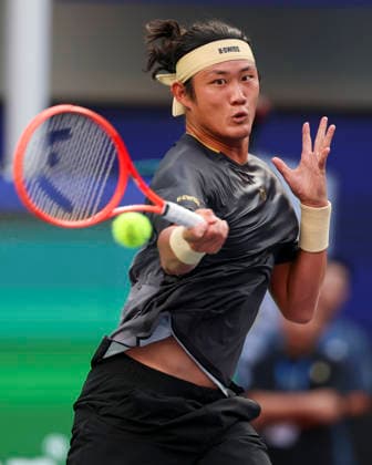 (261007) -- SHANGHAI, Oct. 7, 2026 -- Zhang Zhizhen hits a return during the men s singles first round match between Zhang Zhizhen of China and Tomas Machac of the Czech Republic at the 2026 ATP, Tennis Herren tour Shanghai Masters tennis tournament in Shanghai, China, Oct. 7, 2026. ) (SP)CHINA-SHANGHAI-TENNIS-SHANGHAI MASTERS-MEN S SINGLES (CN) WangxXiang 