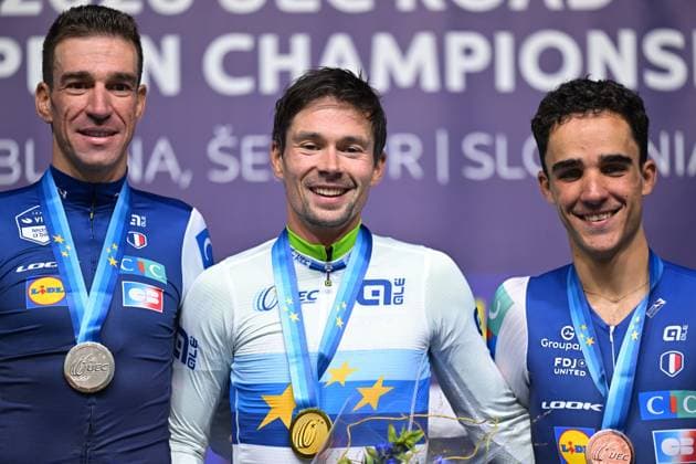 France s Bruno Armirail; Slovenia s Primoz Roglic and France s Maxime Decomble celebrate on the podium of the Men Elite Individual Time Trial race (22km) at the cycling UEC Road European Championships, in Ljubljana, Slovenia, on Wednesday 7 October 2026. The UEC Road European Championships are taking place from 02 to 07 October in Ljubljana, Slovenia. DAVIDxPINTENS  x189071413x