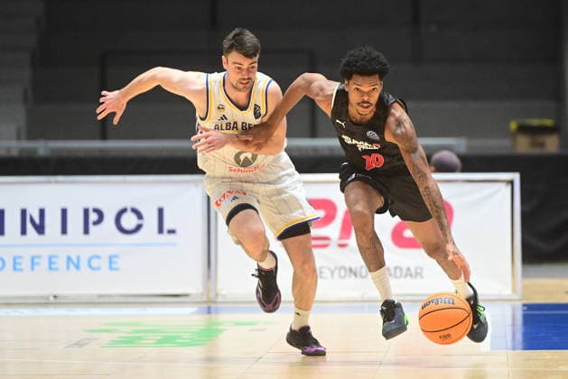 Men s basketball Champions League, group G, 1st round, match Slavia Praha NBK and Alba Berlin in Pardubice, Czech Republic, October 7, 2026. From left Jonas Mattisseck of Berlin, Ronaldo Segu of Slavia Praha NBK. (CTKxPhoto JosefxVostarek) CTKPhotoP2026100707158  CTKPhotoP2026100707158