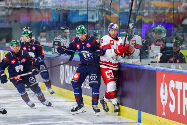 Ice hockey, Eishockey - CHL, EC RBS vs Berlin SALZBURG,AUSTRIA,07.OCT.26 - ICE HOCKEY - CHL, Champions Hockey League, group stage, EC Red Bull Salzburg vs Eisbaeren Berlin. Image shows Rihards Griva (Berlin) and Michael Raffl (EC RBS).  GEPAxpictures xDavidxGeieregger