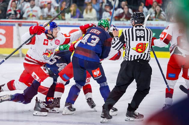 Ice hockey, Eishockey - CHL, EC RBS vs Berlin SALZBURG,AUSTRIA,07.OCT.26 - ICE HOCKEY - CHL, Champions Hockey League, group stage, EC Red Bull Salzburg vs Eisbaeren Berlin. Image shows Dennis Eamon Robertson (EC RBS) and Andreas Eder (Berlin).  GEPAxpictures xDavidxGeieregger