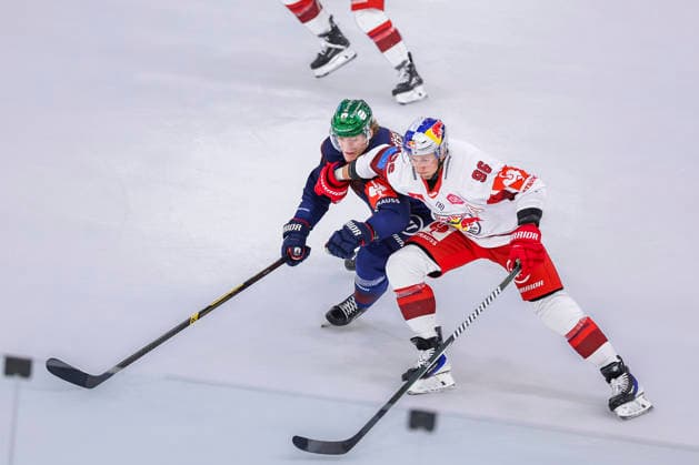 Ice hockey, Eishockey - CHL, EC RBS vs Berlin SALZBURG,AUSTRIA,07.OCT.26 - ICE HOCKEY - CHL, Champions Hockey League, group stage, EC Red Bull Salzburg vs Eisbaeren Berlin. Image shows Eric Hoerdler (Berlin) and Mario Huber (EC RBS).  GEPAxpictures xDavidxGeieregger