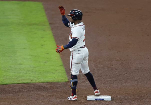 Atlanta Braves Ozzie Albies (1) stands on second base after hitting a double against the Los Angeles Dodgers in the sixth inning in an MLB, Baseball Herren, USA National League Division Series playoff game at Truist Park in Atlanta, Georgia, on Wednesday, October 7, 2026.  ATL20261007719 MIKExZARRILLI