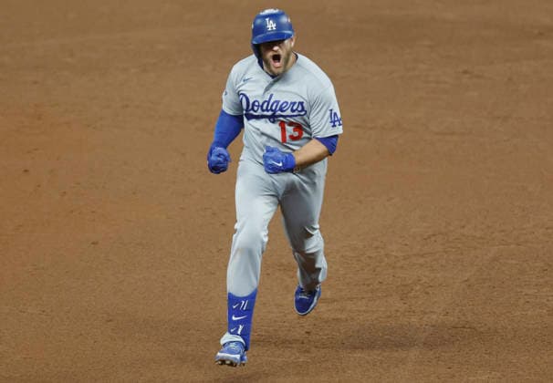 Los Angeles Dodgers Max Muncy (13) runs the bases after hitting a solo home run in the ninth inning against the Atlanta Braves in an MLB, Baseball Herren, USA National League Division Series playoff game at Truist Park in Atlanta, Georgia, on Wednesday, October 7, 2026. The Dodgers defeated the Braves 4-1 to win the series 3 games to 1 and advance to the Championship round.  ATL20261007724 MIKExZARRILLI