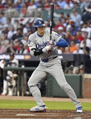 Baseball: Division Series between Dodgers and Braves Los Angeles Dodgers designated hitter Shohei Ohtani draws a walk in the second inning of Game 4 of the National League Division Series against the Atlanta Braves at Truist Park in Atlanta on Oct. 7, 2026.  A14AA0005630399P