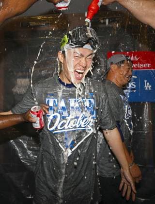 Baseball: Division Series between Dodgers and Braves Los Angeles Dodgers pitcher Yoshinobu Yamamoto celebrates after team wins Game 4 of the National League Division Series against the Atlanta Braves at Truist Park in Atlanta on Oct. 7, 2026, and advances to the National League Championship Series.  A14AA0005630431P