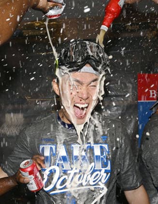 Baseball: Division Series between Dodgers and Braves Los Angeles Dodgers pitcher Yoshinobu Yamamoto celebrates after team wins Game 4 of the National League Division Series against the Atlanta Braves at Truist Park in Atlanta on Oct. 7, 2026, and advances to the National League Championship Series.  A14AA0005630432P