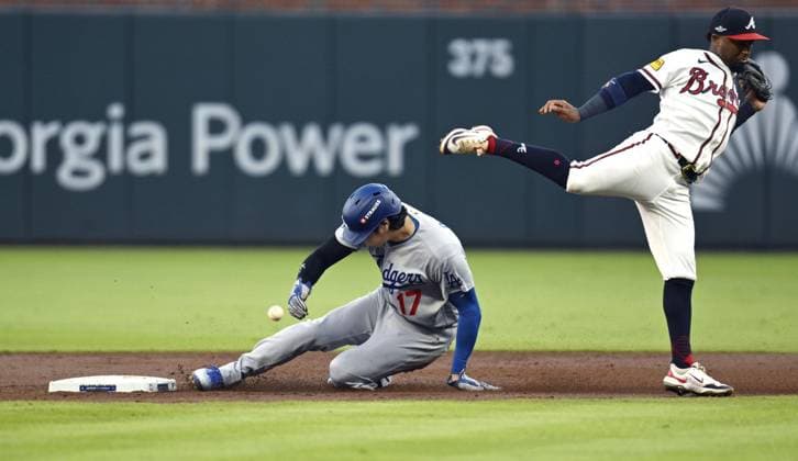 Baseball: Division Series between Dodgers and Braves Los Angeles Dodgers designated hitter Shohei Ohtani (17) steals second base as Atlanta Braves second baseman Ozzie Albies fails to gather the ball during the second inning of Game 4 of the National League Division Series at Truist Park in Atlanta on Oct. 7, 2026.  A14AA0005630442P