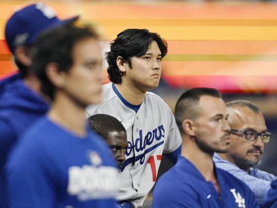 Baseball: Division Series between Dodgers and Braves Los Angeles Dodgers designated hitter Shohei Ohtani looks on from the dugout during the seventh inning of Game 4 of the National League Division Series against the Atlanta Braves at Truist Park in Atlanta on Oct. 7, 2026.  A14AA0005630444P