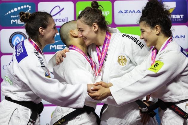 AZERBAIJAN, BAKU - OCTOBER 8, 2026: 2nd placed Giovanna Scoccimarro of Germany, 1st placed Ai Tsunoda Roustant of Spain, 3rd placed Michaela Polleres of Austria and Madina Taimazova (L-R) of Russia are pictured during an award ceremony for the women s -70 kg category during the 2026 World Judo Championships at the National Gymnastics Arena. Mikhail Sinitsyn TASS  98956120