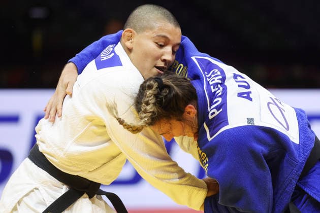 AZERBAIJAN, BAKU - OCTOBER 8, 2026: Ai Tsunoda Roustant (L) of Spain and Michaela Polleres of Austria compete in their -70 kg bout as part of the 2026 World Judo Championships at the National Gymnastics Arena. Mikhail Sinitsyn TASS  98957473