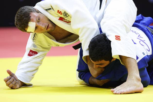 AZERBAIJAN, BAKU - OCTOBER 8, 2026: Murad Fatiyev (bottom) of Azerbaijan and Nemanja Majdov of Serbia compete in their -90 kg bout as part of the 2026 World Judo Championships at the National Gymnastics Arena. Mikhail Sinitsyn TASS  98958128