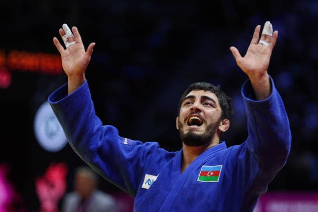 AZERBAIJAN, BAKU - OCTOBER 8, 2026: Murad Fatiyev of Azerbaijan celebrates his victory after a -90 kg bout against Nemanja Majdov of Serbia as part of the 2026 World Judo Championships at the National Gymnastics Arena. Mikhail Sinitsyn TASS  98958145