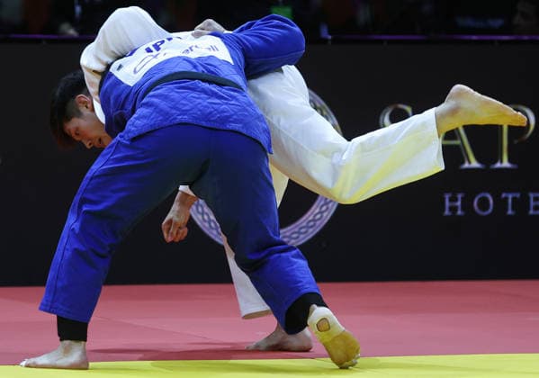 AZERBAIJAN, BAKU - OCTOBER 8, 2026: Sanshiro Murao (in white) of Japan and Goki Tajima of Japan compete in their -90 kg bout as part of the 2026 World Judo Championships at the National Gymnastics Arena. Mikhail Sinitsyn TASS  98959049