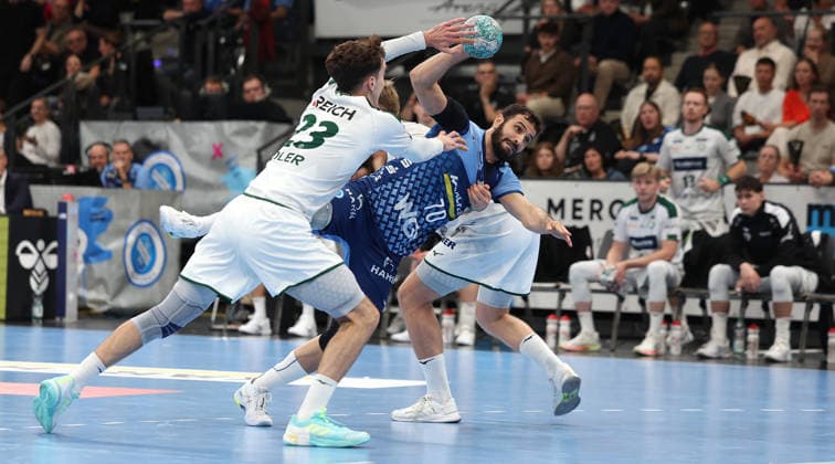 2026.10.08 Deutschland, Stuttgart Handball TVB Stuttgart vs. HSG Wetzlar, v.l. Marti Soler (Wetzlar), Mohamed Amine Darmoul (TVB)