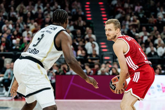 MUNICH, GERMANY - OCTOBER 08: Niels Giffey (FC Bayern Muenchen, 5) controls the ball against Kevin Kokila (Virtus Bologna, 3) during the Turkish Airlines EuroLeague match between FC Bayern Muenchen vs. Virtus Bologna at SAP Garden on round 4 of Turkish Airlines EuroLeague on October 08, 2026 in Munich, Germany. Bavaria Germany Copyright: xSteffiexWunderlx