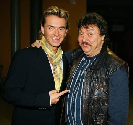 Fernsehmoderator Florian Silbereisen (li.) und Sänger Achim Mentzel (beide GER) anlässlich der Fernsehshow - Winterfest der Volksmusik - in Halle an der Saale