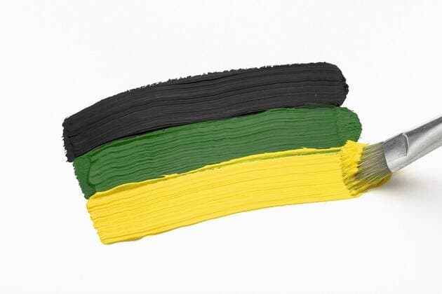 Schwarzer, grüner und gelber Pinselstrich