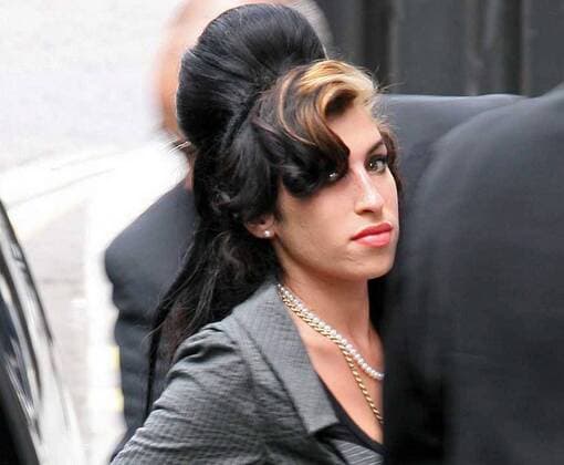 Amy Winehouse appears at the City of Westminster Magistrates Court on July 23, 2009 in London. She is charged with assault over claims she hit a fan at the End Of Summer Ball in Berkley Square, last year September. Picture Zed Jameson LFI Winehouse in Court  29641