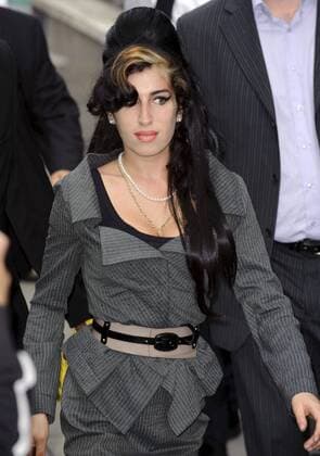 Amy Winehouse appears at the City of Westminster Magistrates Court on July 23, 2009 in London. She is charged with assault over claims she hit a fan at the End Of Summer Ball in Berkley Square, last year September. Picture Jonathan Short LFI Winehouse in Court  29641
