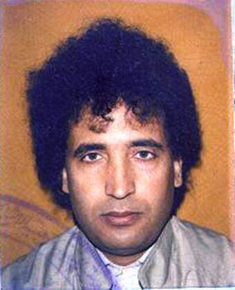 In a photo released by the Crown Office, Lockerbie bomber Abdel Basset al-Megrahi, the Libyan man who was convicted of the deadly 1988 bombing of Pan Am Flight 103, is shown in his passport picture on August 20, 2009. Al-Megrahi, diagnosed with terminal cancer, was released today by Scottish officials on compassionate grounds and returned to Libya. UPI Crown Office Lockerbie Bomber is freed in Scotland  WAX20090820101