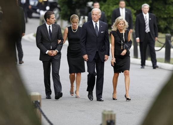 U.S. Vice President Joe Biden (2nd from R) arrives at Arlington National Cemetery with his wife Dr. Jill Biden (R), his son Hunter (L) and his daughter-in-law Kathleen for the internment services for U.S. Senator Edward Kennedy at Arlington National Cemetery in Arlington, Virginia, August 29, 2009. Kennedy died late Tuesday after a battle with cancer. UPI Jim Bourg Pool Burial service for U.S. Senator Edward Kennedy at Arlington  WAX20090829159