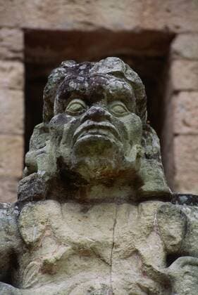 SCULPTURE of IK, MAYAN RAIN GOD - COPAN RUINS, HONDURAS - McPLOV