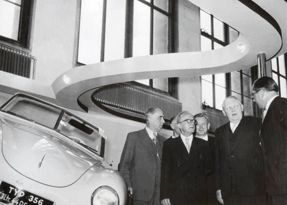 Sep 08, 1951 - Berlin, Germany - As Germany s minister of economic affairs from 1949 to 1963, LUDWIG ERHARD crafted the plan for West Germany s post-World War II economic recovery, sometimes called the German economic miracle. In 1957 he was named vice chancellor, and in 1963 he succeeded Konrad Adenauer as chancellor. In late 1966, Erhard s government fell after the four Free Democratic party ministers in his cabinet resigned and left him without a ruling majority in the federal parliament. PICTURED: LUDWIG ERHARD (2nd from the right) next to Porsche 356 visiting International Auto - Salon. Berlin Germany  - ZUMAk09