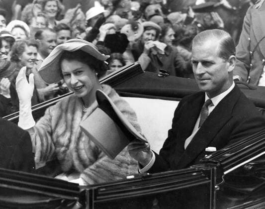 Jun 19, 1952 - Ascot, UK - The elder daughter of King George VI and Queen Elizabeth, ELIZABETH WINDSOR (named Elizabeth II) became Queen at the age of 25, and has reigned through more than five decades of enormous social change and development. For more than 50 years, during a period of great social change, The Queen has carried out her political duties as Head of State, the ceremonial responsibilities of the Sovereign and an unprecedented programme of visits in the United Kingdom, Commonwealth and overseas. PICTURED: QUEEN ELIZABETH and PRINCE PHILIP arriving in Ascot. Ascot UK  - ZUMAk09