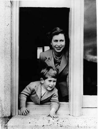 Nov 14, 1952; London, UK; PRINCE CHARLES fourth birthday publicity photo in a drawing room at Buckingham Palace. Pictured with Queen ELIZABETH II.  - ZUMAk09