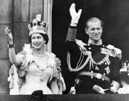Jun 02, 1953 - London, England, UK - QUEEN ELIZABETH II has been crowned at a coronation ceremony in Westminster Abbey in London. In front of more than 8,000 guests, including prime ministers and heads of state from around the Commonwealth, she took the Coronation Oath and is now bound to serve her people and to maintain the laws of God. The princess formally proclaimed herself Queen and Head of the Commonwealth and Defender of the Faith in February 1952 but the amount of planning and a wish for a sunny day for the occasion led to the long but excited wait for this day. PICTURED: QUEEN ELIZABETH and PRINCE PHILIP after the coronation. London UK  - ZUMAk09