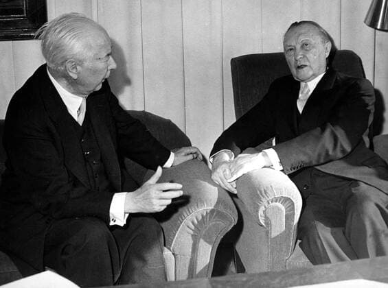 Nov 02, 1955 - Bad Honnef, Germany - West Germany s first chancellor KONRAD ADENAUER began his career in politics as a member of the Cologne City Council, becoming lord mayor of the city. After the Nazis came to power in 1933, Adenauer, who had not hidden distaste for them, lost his positions, was forced to go into exile for a year in an abbey and was later interned in a prison camp. Adenauer was elected Chancellor of the Federal Republic of Germany on 15 September 1949. His main aim was to ensure West Germany s transition to a sovereign, democratic state. He held power for the next fourteen years and during that time played an important role in restoring good relations with France and the United States. PICTURED: KONRAD ADENAUER (right) and German president THEODOR HEUSS. Bad Honnef Germany  - ZUMAk09