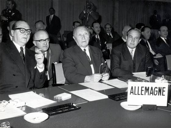 May 02, 1957 - Bonn, Germany - West Germany s first chancellor KONRAD ADENAUER began his career in politics as a member of the Cologne City Council, becoming lord mayor of the city. After the Nazis came to power in 1933, Adenauer, who had not hidden distaste for them, lost his positions, was forced to go into exile for a year in an abbey and was later interned in a prison camp. Adenauer was elected Chancellor of the Federal Republic of Germany on 15 September 1949. His main aim was to ensure West Germany s transition to a sovereign, democratic state. He held power for the next fourteen years and during that time played an important role in restoring good relations with France and the United States. PICTURED: Secretary of State HEINRICH VON BRENTANO, Under-Secretary of State WALTER HALLSTEIN, KONRAD ADENAUER and NATO ambassador HERBERT BLANKENHORN durnig a NATO conference. Bonn German - ZUMAk09