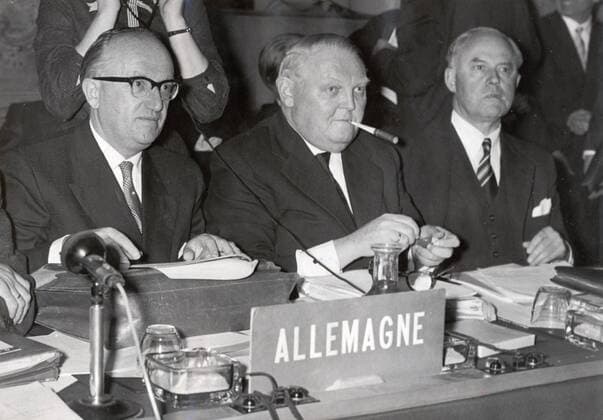 Oct 16, 1957 - Paris, France - As Germany s minister of economic affairs from 1949 to 1963, LUDWIG ERHARD crafted the plan for West Germany s post-World War II economic recovery, sometimes called the German economic miracle. In 1957 he was named vice chancellor, and in 1963 he succeeded Konrad Adenauer as chancellor. In late 1966, Erhard s government fell after the four Free Democratic party ministers in his cabinet resigned and left him without a ruling majority in the federal parliament. PICTURED: Opening of the talks on European free trade area - LUDWIG ERHARD and State Secretary WALTER HALLSTEIN. Paris France  - ZUMAk09