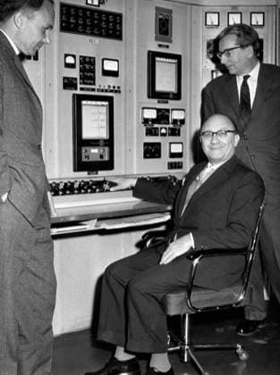 Mar 14, 1959; Berlin, Germany; Pressing a button, the minister of Atom Affairs Dr. SIEGFRIED BALKE on March 14th opened the Institute for Nuclear Research in Berlin. After 3 years of building, the Institute has now been finished, casting 15 million marks. The picture shows (from L-R) Assistent Dr, SCHNURR, sitting Minister Dr. Siefried Balke and the Director of the Institute of Nuclear Research (Department Nuclear Chemistry) Professor KARL ERICH ZIMEN. Berlin Germany  - ZUMAk09