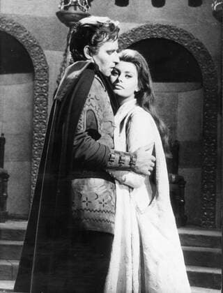 Nov 21, 1960; Madrid, Spain; Actor CHARLTON HESTON known for his religious roles in Ben-Hur and The Ten Commandments , pictured with Italian actress SOPHIA LOREN in a love seen from El Cid . Madrid Spain  - ZUMAk09